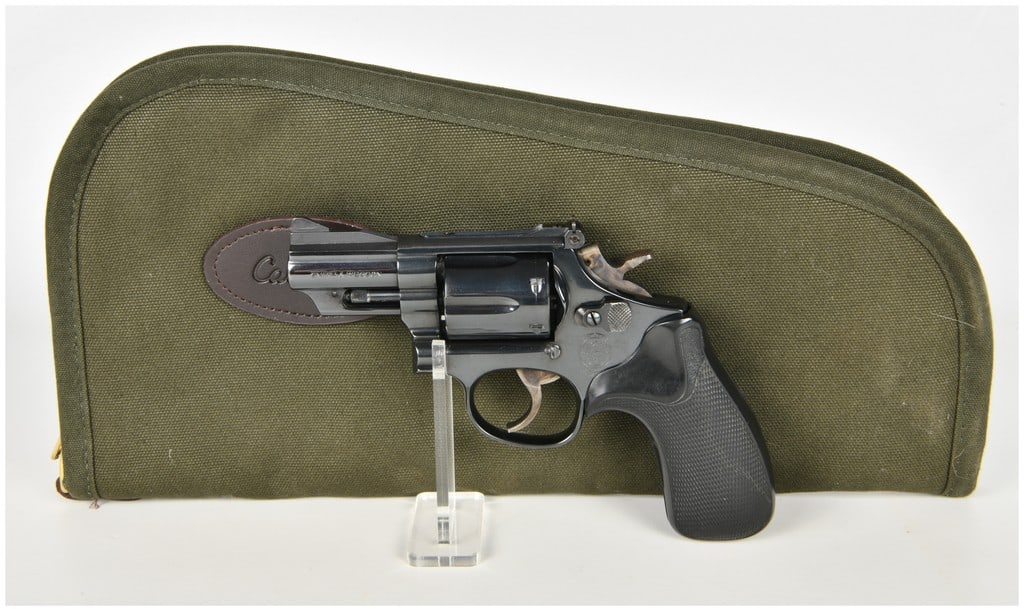 Smith & Wesson Model 19-7 Double Action Revolver .357 Magnum with 2.5 Inch Barrel: This lot features a Smith & Wesson Model 19-7 double-action revolver chambered for .357 Magnum, originally marketed as the Combat Magnum. This example is configured with a 2.5-inch snub-nose barrel, a