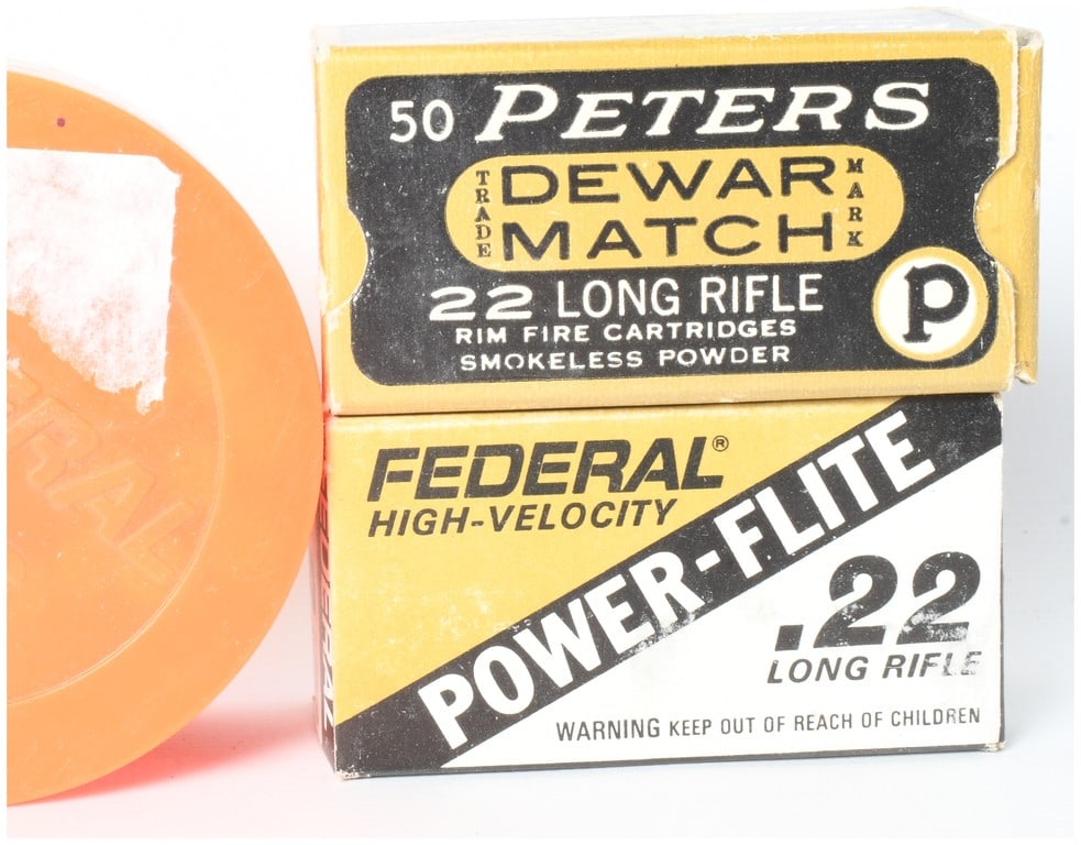 A Lot of 150 Rounds of .22 Long Rifle Ammunition by Peters and Federal: This lot consists of 150 rounds of .22 Long Rifle rimfire ammunition, comprising two vintage boxes and a quantity of loose cartridges. The first component is a full fifty-round box of Peters Dewar Mat