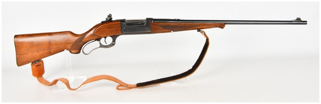 Savage Model 99 Lever Action Rifle .300 Savage with 24 Inch Barrel: This Savage Model 99 is a classic lever action rifle chambered in .300 Savage featuring the iconic internal rotary magazine. The firearm is configured with a blued steel barrel and receiver showing a 