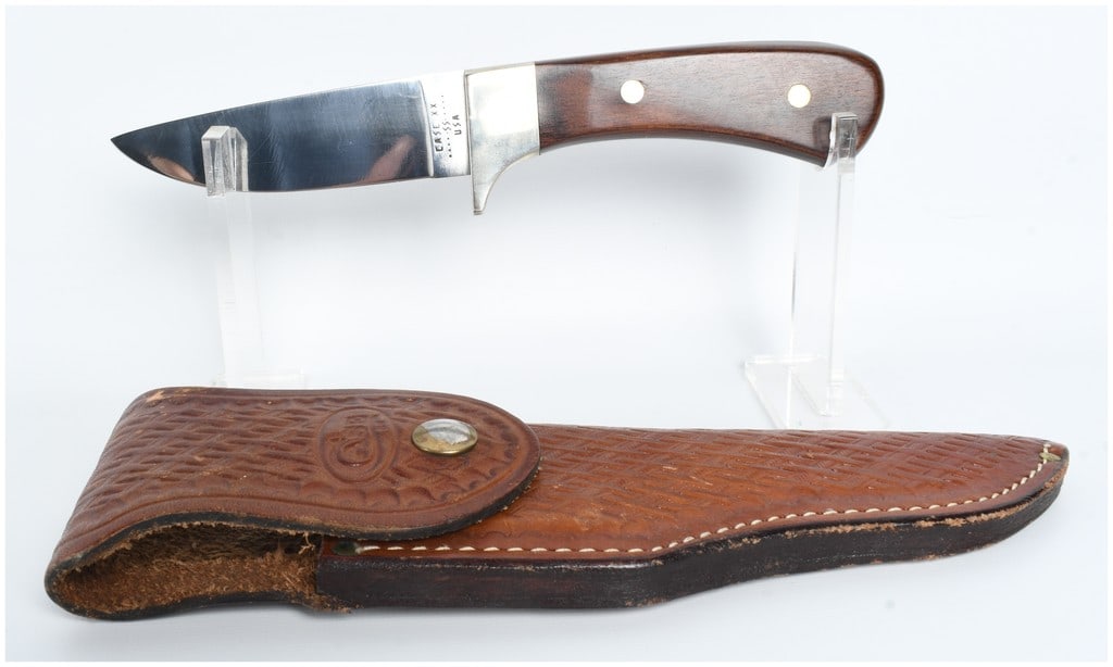 Case XX 1982 Arapaho Hunter R503 SSP Fixed Blade Knife and Sheath: This is a W.R. Case and Sons fixed blade hunting knife, identified as the Arapaho Hunter, pattern R503 SSP. The knife features a high-polish stainless steel blade with a trailing point profile. The ha