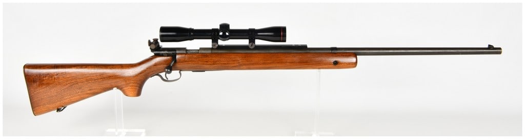 Winchester Model 75 Bolt Action Rifle .22 Long Rifle 1941: This Winchester Model 75 is a bolt-action target rifle chambered in .22 Long Rifle designed for precision shooting. The barrel features a heavy profile and is marked in two lines with MADE IN U.S.A. W