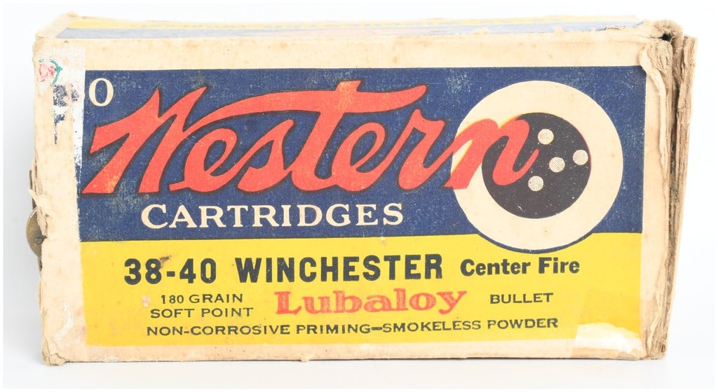 Western Cartridge Company .38-40 Winchester 180 Grain Soft Point Ammunition A Lot of 27 Rounds: This lot consists of 27 rounds of Western Cartridge Company .38-40 Winchester center fire ammunition housed in a vintage two-piece cardboard box. The cartridges are loaded with 180 grain Lubaloy soft 