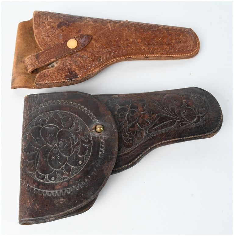 A Pair of Tooled Leather Pistol Holsters including an H.H. Heiser Model 745 (1 of 7)