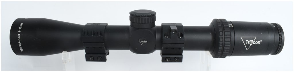 Trijicon Ascent 3-12x40 Rifle Scope: This Trijicon Ascent 3-12x40 rifle scope is finished in matte black and features a versatile magnification range suitable for various hunting and target shooting applications. The optic is currently m