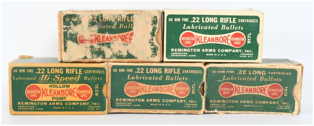 A Lot of 243 Remington-UMC Kleanbore .22 Caliber Rimfire Cartridges: This lot comprises 243 rounds of vintage Remington-UMC Kleanbore .22 caliber rimfire ammunition, distributed among five original cardboard display boxes. The collection features three boxes of .22 Lon