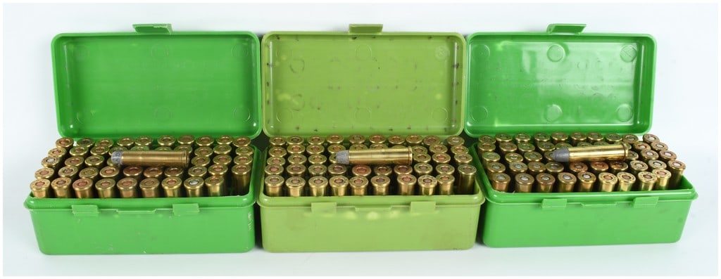 A Lot of 150 Rounds of Remanufactured .32-20 Winchester Ammunition: This lot consists of 150 rounds of remanufactured .32-20 Winchester ammunition, also known as .32 W.C.F., presented in three green plastic storage cases. The cartridges are loaded with flat-nose lead 