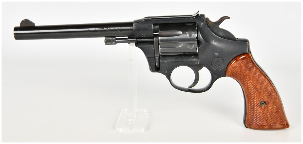 High Standard Sentinel Deluxe Double Action Revolver .22 Caliber with 6 Inch Barrel: This High Standard Sentinel Deluxe is a nine-shot double-action revolver chambered in .22 caliber, featuring a 6-inch barrel intended for target shooting and recreational use. The firearm is finished 