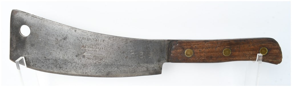 Foster Bros Model 239 Solid Steel Meat Cleaver: One antique Foster Bros professional meat cleaver, model 239. This heavy-duty tool is constructed with a broad, curved carbon steel blade and a full tang. The handle features two dark wood scales held