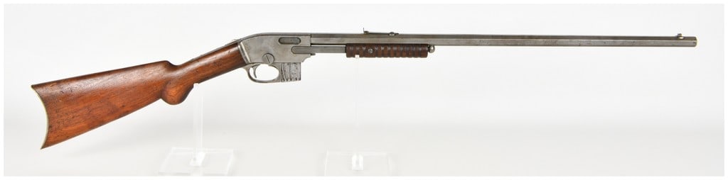 Savage Model 1903 Pump Action Rifle .22 S L & LR with 24 Inch Octagonal Barrel: This Savage Model 1903 is a slide-action repeating rifle chambered for .22 Short, Long, and Long Rifle cartridges. The firearm is configured with a 24 inch octagonal barrel and utilizes a detachable b