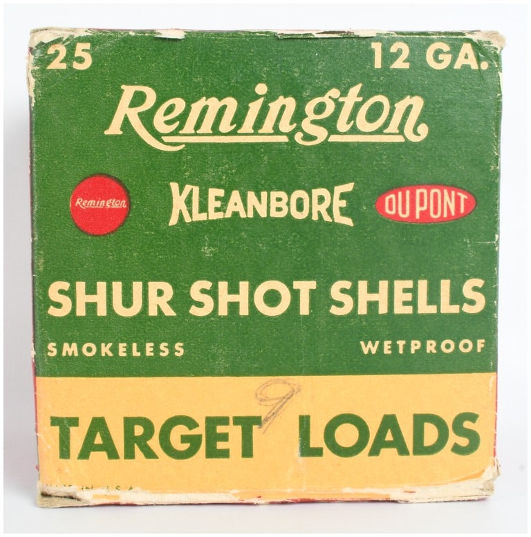 Remington Kleanbore Shur Shot Shells 12-gauge Ammunition 25 Rounds: This lot consists of a vintage two-piece cardboard box containing a quantity of 25 rounds of 12-gauge ammunition. The packaging features the classic green, red, and yellow graphics associated with the