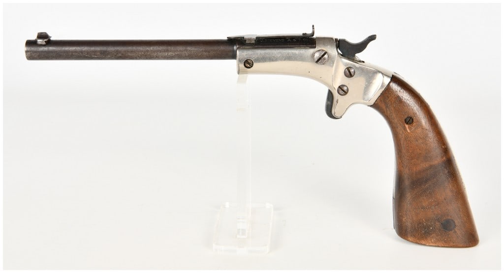Stevens Diamond No. 43 Second Issue Tip Up Single Shot Pistol .22 LR with 6 Inch Barrel: This is a single shot tip up target pistol manufactured by the J. Stevens Arms and Tool Company, designated as the Diamond No. 43 Second Issue. Chambered for .22 caliber rimfire, the firearm features 