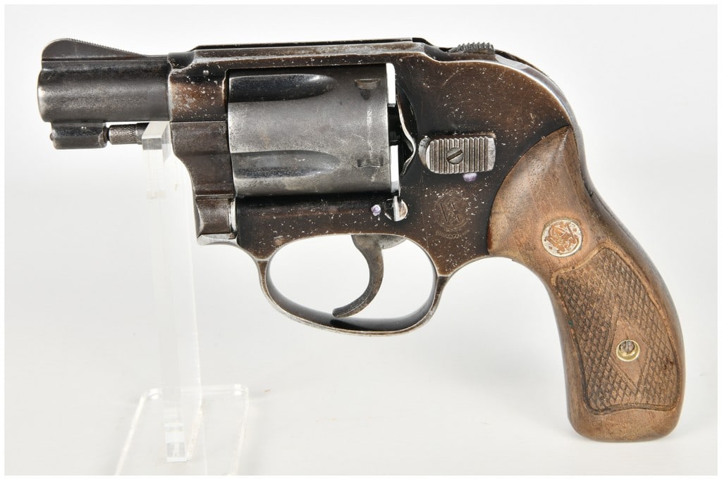 Smith & Wesson Model 42 Airweight Centennial Double Action Only Revolver .38 Special with 2 Inch: This Smith & Wesson Model 42 Airweight is a compact five-shot Centennial-style revolver designed for concealed carry, chambered in .38 Special ammunition. It features a 2-inch barrel, a shrouded inter