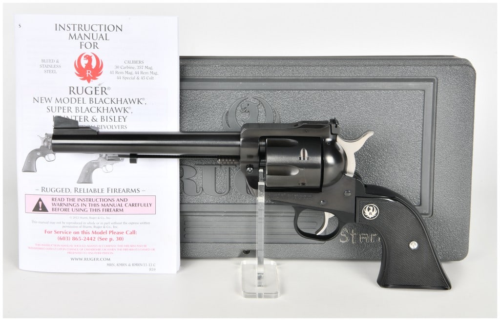 Ruger New Model Blackhawk Single Action Revolver .357 Magnum with 6.5 Inch Barrel: This lot features a Ruger New Model Blackhawk single-action revolver chambered for the .357 Magnum cartridge. The firearm is equipped with a 6.5 inch barrel featuring a ramped front sight and a micro-