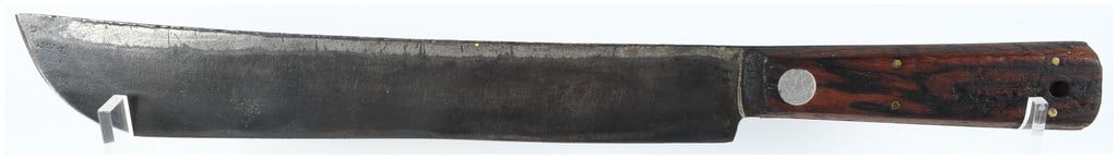 Antique Blacksmith Made Large Carbon Steel Butcher Knife: This is a large hand-forged butcher knife featuring a long, single-edged carbon steel blade. The blade is constructed with a straight spine and a distinct curve toward the tip, showing visible evidenc