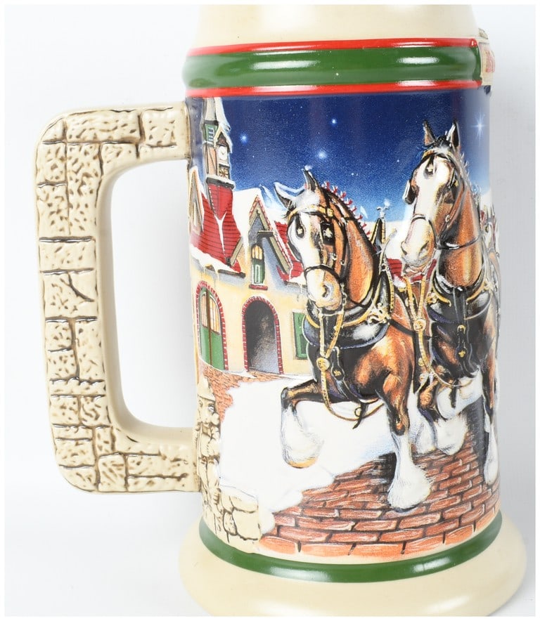 1998 Budweiser Holiday Stein Grant's Farm Holiday: One 1998 Budweiser Holiday Stein titled Grant's Farm Holiday, identified by model number CS343. This ceramic beer stein was handcrafted expressly for Anheuser-Busch, Inc. by Ceramarte of Brazil. The b