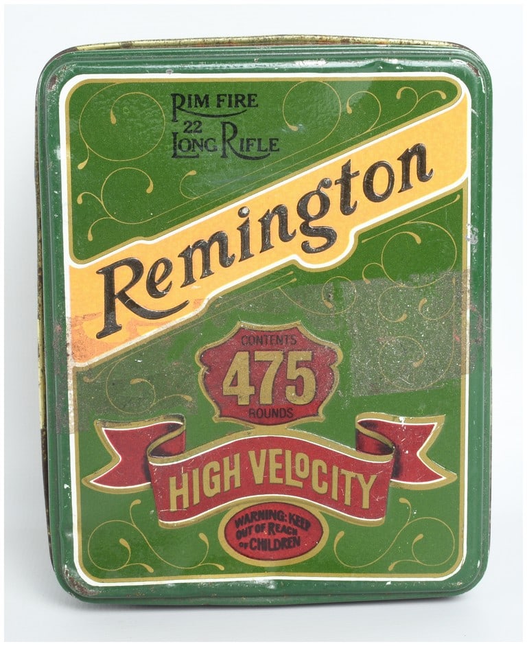 A Lot of 475 Remington UMC Kleanbore High Velocity Rimfire Ammunition .22 Long Rifle: This auction lot features a group of 475 Remington UMC Kleanbore High Velocity .22 Long Rifle rimfire cartridges presented in a green metal collector tin. The ammunition consists of a variety of loose