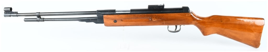 Shanghai Model B3-1 Underlever Spring-Piston Air Rifle .177 Caliber: This Shanghai Model B3-1 is an underlever spring-piston air rifle chambered in .177 caliber, designed for target shooting and recreational use. The rifle features a blued steel barrel and receiver ass