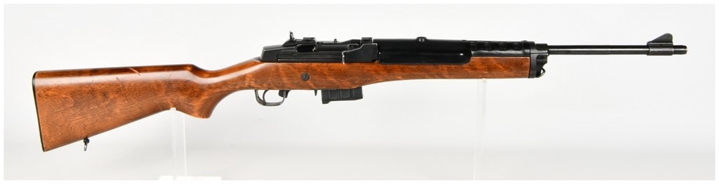 Ruger Ranch Rifle Semi-Automatic Rifle .223 with 18.5 Inch Barrel: This Ruger Ranch Rifle is a semi-automatic centerfire rifle chambered in .223 caliber, utilizing a gas-operated rotating bolt action based on the classic military design. The firearm is equipped with 