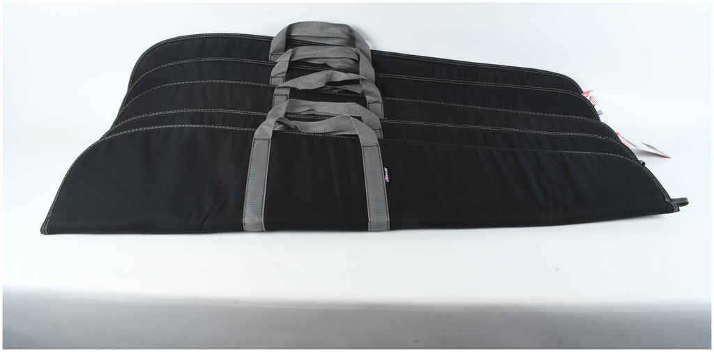 5 Allen Company Eldorado Rifle Cases: A set of 5 soft-sided rifle cases by the Allen Company, model 55038A Eldorado. The cases are constructed from a black polyester exterior with gray webbed nylon carrying handles and white contrast stit
