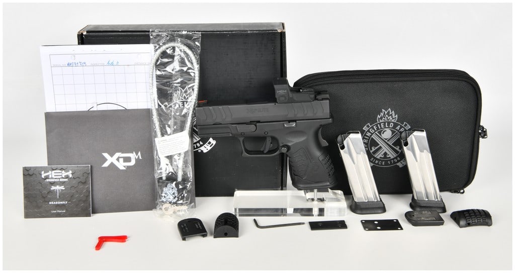 Springfield Armory XD-M Elite Striker-Fired Semi-Automatic Pistol 9mm with 3.8 Inch Barrel: This Springfield Armory XD-M Elite is a compact striker-fired semi-automatic pistol chambered in 9mm. It is configured with a 3.8-inch match-grade barrel, a matte black Melonite-finished slide with ag