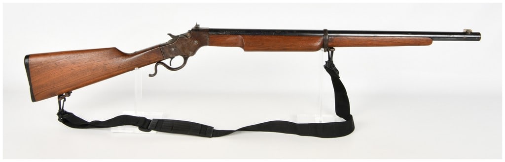 Stevens Model 414 Armory Model Single Shot Lever Action Rifle .22 Short with 26 Inch Barrel: This Stevens Model 414 Armory Model is a single-shot lever-action rifle chambered for the .22 Short cartridge, specifically designed for target shooting and military-style training. It features a heav