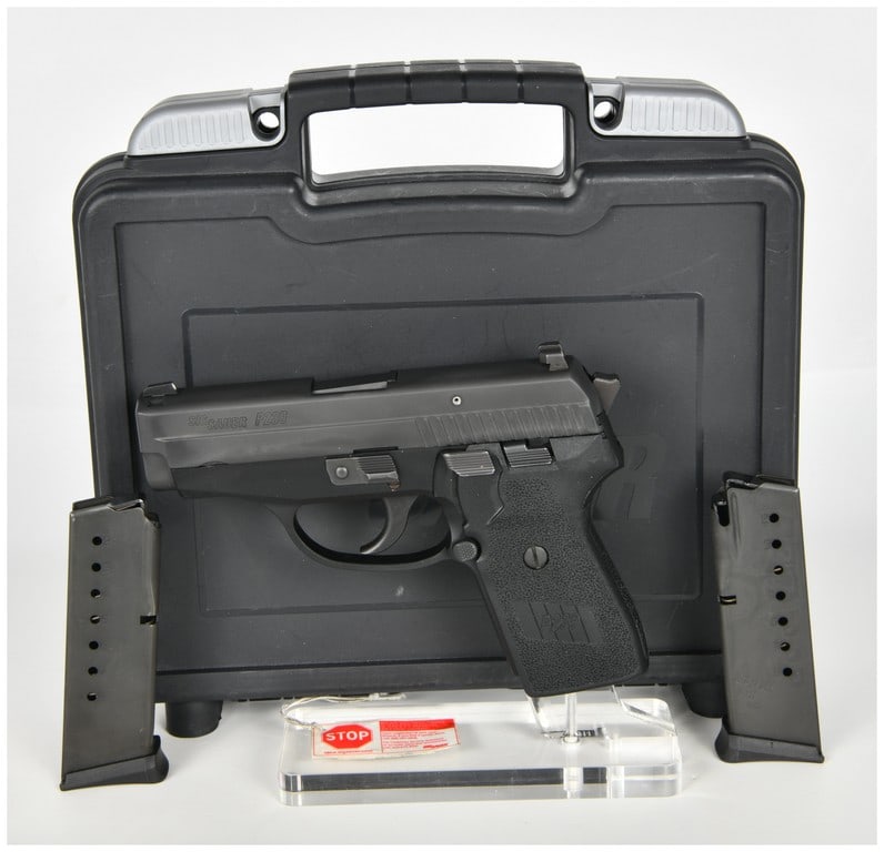 SIG Sauer P239 Semi-Automatic Pistol 9mm Parabellum with 3.6 Inch Barrel: This SIG Sauer model P239 is a compact semi-automatic pistol chambered in 9mm Parabellum, designed for reliable concealed carry. The firearm features a matte black Nitron finish on the slide, a black 