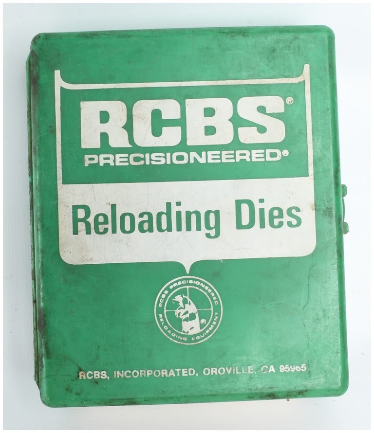 RCBS Precisioneered 30-06 Full Length Die Set Part Number 14801: This RCBS Precisioneered full-length reloading die set is produced for .30-06 caliber ammunition. The set is contained within its original green plastic storage case. The exterior lid features the RCB