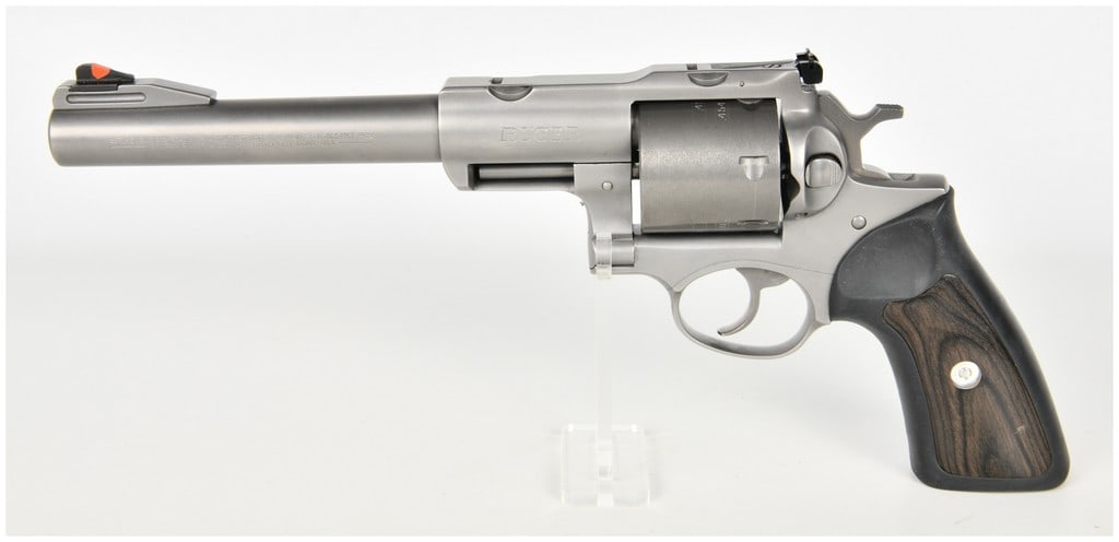 Ruger Super Redhawk Double-Action Revolver .454 Casull and .45 Colt with 7.5 Inch Barrel: This Ruger Super Redhawk is a robust double-action revolver chambered for both .454 Casull and .45 Colt cartridges, featuring a 7.5-inch barrel with a target crown and an unfluted six-shot cylinder. T