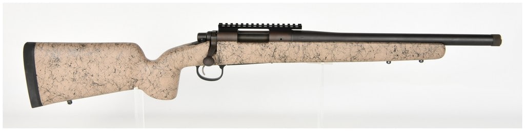 Remington Model 700 Bolt Action Rifle .308 Win with 20 Inch Barrel: This is a Remington Model 700 bolt-action rifle chambered in .308 Winchester, designed for tactical or precision shooting. The rifle is equipped with a 20-inch heavy contour barrel featuring a 1 in 10