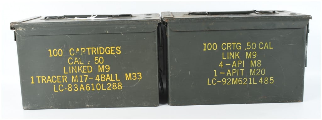 A Pair of US Military Surplus .50 Caliber M2A1 Steel Ammunition Cans: This lot consists of two US military surplus M2A1 ammunition containers, originally designed for the storage and transportation of linked .50 caliber cartridges. These containers are constructed of he