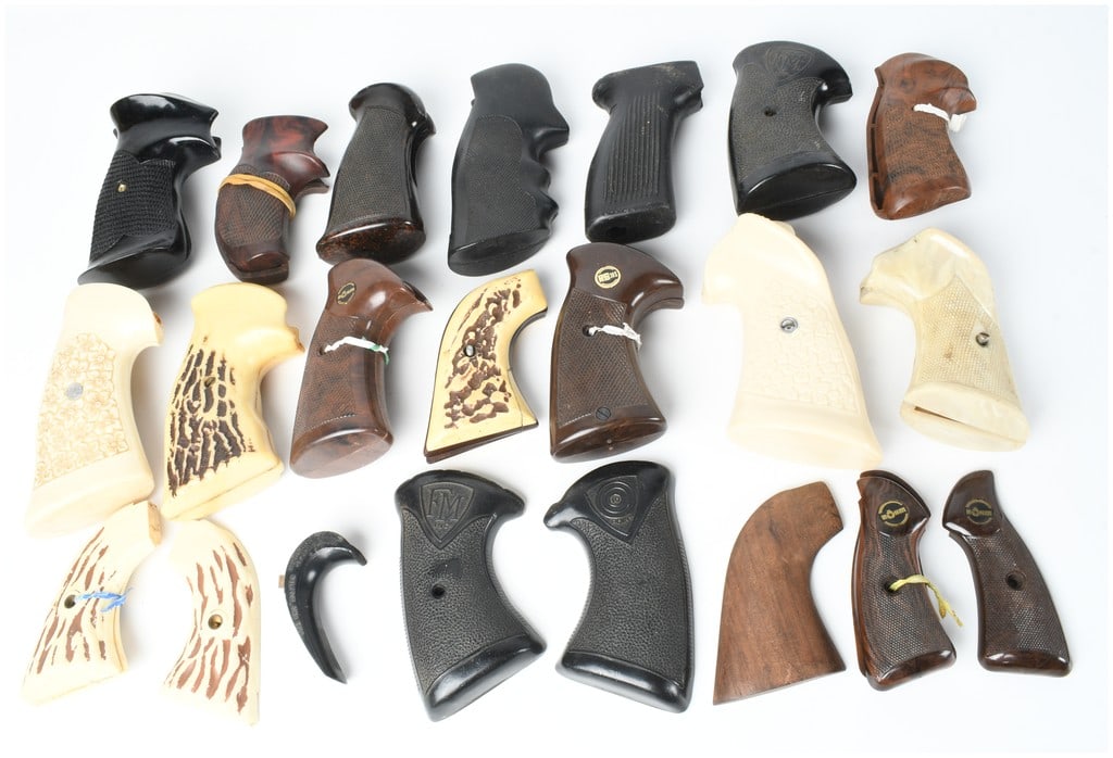 A Collection of 17 Assorted Handgun Grips and Accessories: A collection of 17 assorted handgun grips, panels, and related accessories constructed from various synthetic, rubber, and wood materials. This group features numerous designs including checkered blac
