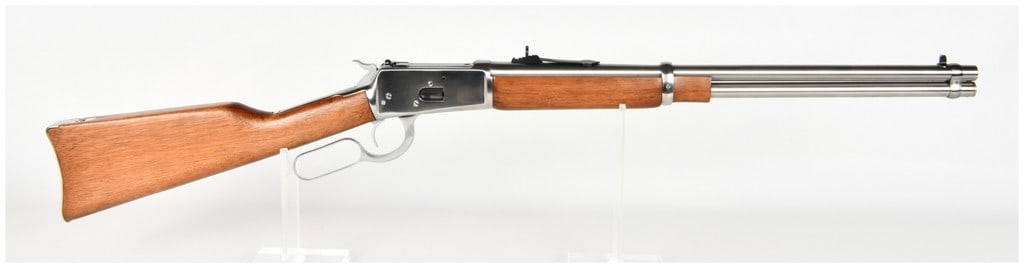 Rossi Model R92 Lever Action Carbine .44 Magnum with 20 Inch Barrel: This Rossi Model R92 is a lever-action carbine chambered in .44 Magnum, configured with a 20-inch barrel and a full-length tubular magazine. The firearm features a polished stainless steel finish acro