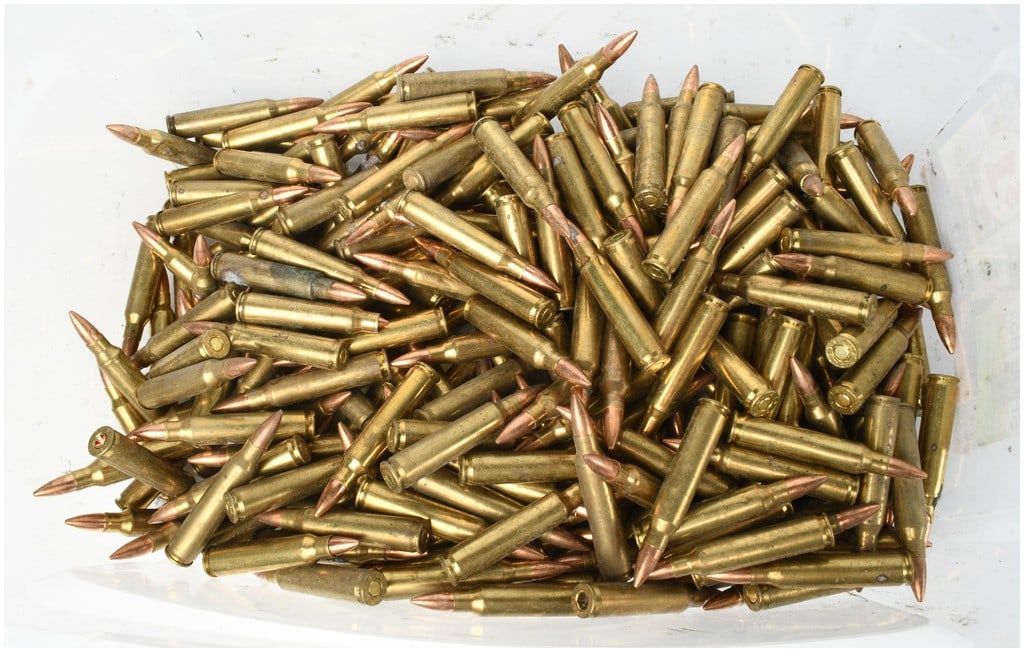 A Lot of 250 Lake City 5.56x45mm NATO Centerfire Rifle Ammunition: This lot consists of 250 loose rounds of 5.56x45mm NATO centerfire rifle ammunition manufactured at the Lake City Army Ammunition Plant. The cartridges are constructed with brass cases and copper-jack
