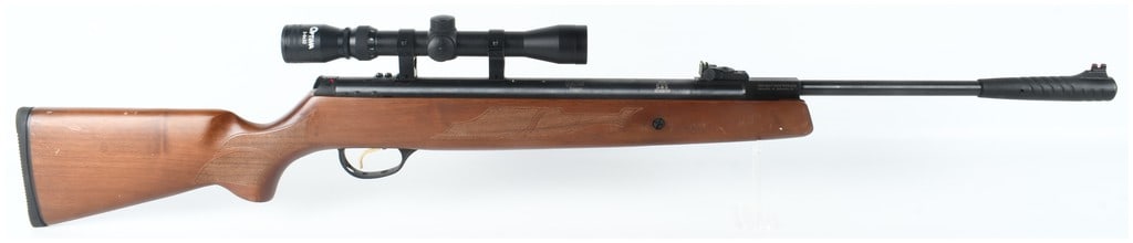 Hatsan Model 95 Break-Barrel Air Rifle .25 Caliber: This Hatsan Model 95 is a break-barrel air rifle chambered in .25 caliber (6.35mm) designed for target shooting and small game hunting. The rifle features a blued steel barrel and receiver mounted in 