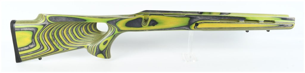 Boyds Varmint Thumbhole Laminated Wood Stock for Remington 700 Short Action: A Boyds Varmint Thumbhole rifle stock designed for a Remington 700 short action. The stock is constructed from laminated wood in a Zombie Green and black color pattern. It features a thumbhole pistol 