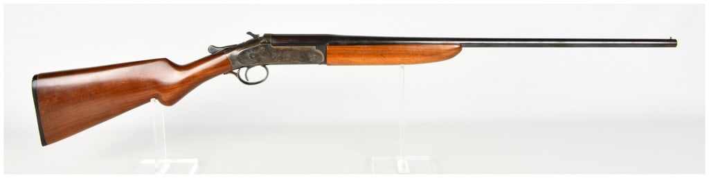Iver Johnson Champion Single Shot Shotgun .410 Gauge with 26 Inch Barrel: This single-item lot consists of one Iver Johnson Champion single-shot break-action shotgun chambered in .410 gauge featuring a 26 inch barrel. The barrel is constructed with a choke bore and specifie