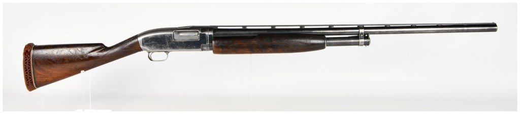 Winchester Model 12 Pump-Action Shotgun 12 Gauge with 30 Inch Barrel: Winchester Model 12 pump-action shotgun chambered in 12 gauge, designed for general field and sport shooting. This example features a 30-inch barrel fitted with a ventilated rib and a single front bea