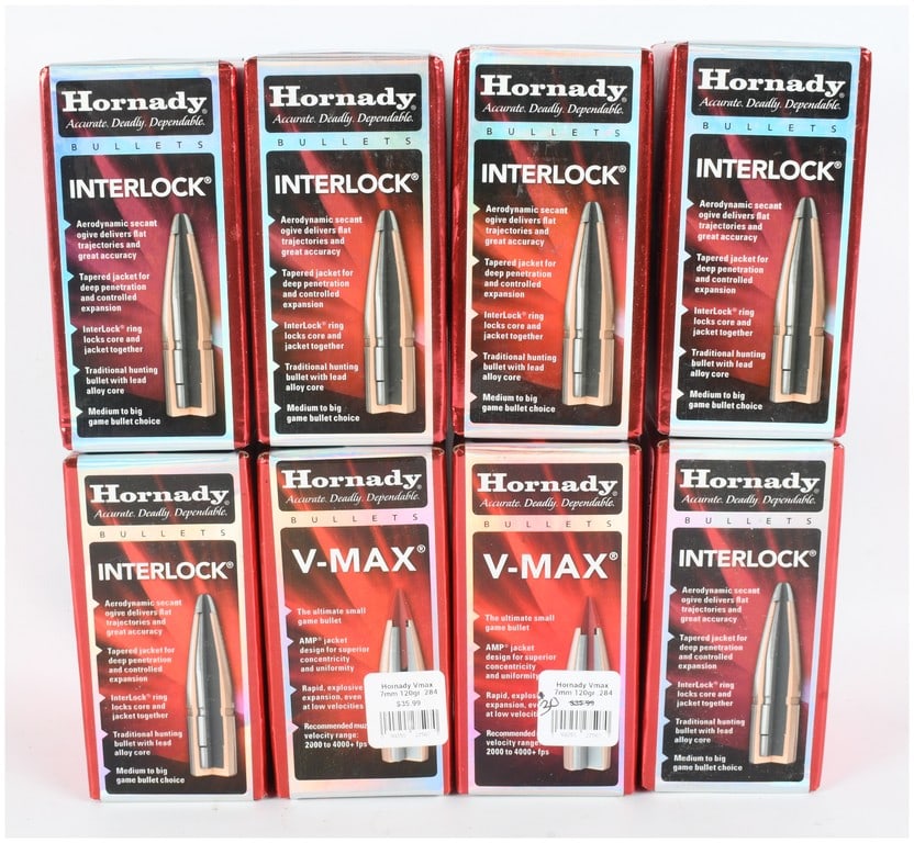 Hornady Interlock and V-MAX Rifle Bullets 7mm and 6.5mm Caliber: This lot consists of a total of 800 Hornady brand rifle bullets for handloading, distributed across eight factory boxes containing 100 units each. The collection includes two boxes of 7mm .284 caliber