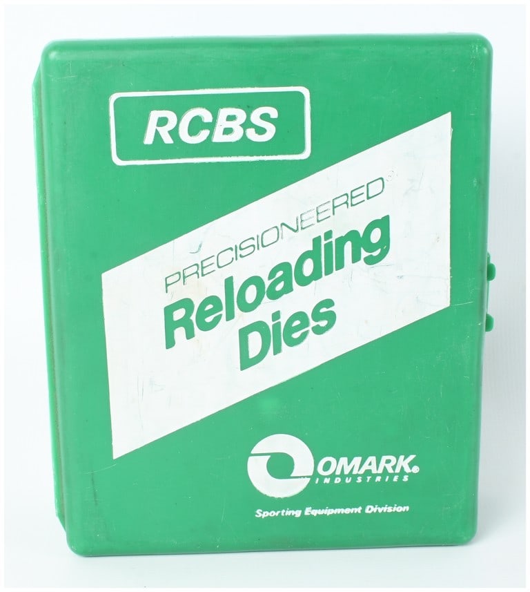 A .308 Winchester Caliber Reloading Die Set in RCBS Case: This reloading die set for .308 Winchester caliber ammunition is presented in a vintage green plastic RCBS Precisioneered case. The case features the Omark Industries Sporting Equipment Division and R