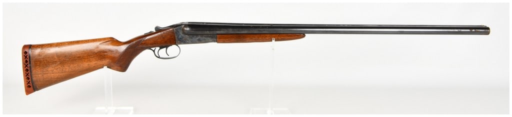 Montgomery Ward and Co. Western Field Model 5100 Side-By-Side Shotgun 12 Gauge with 30 Inch Barrels: This is a Montgomery Ward and Co. Western Field Model 5100 side-by-side break-action shotgun chambered for 12 gauge shells with a 2 3/4 inch chamber. The firearm features 30 inch barrels constructed