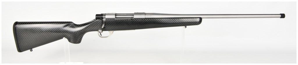 Howa Model 1500 Carbon Elevate Bolt Action Rifle 6.5 Creedmoor with Threaded Stainless Steel Barrel: This is a Howa Model 1500 Carbon Elevate bolt action rifle chambered in 6.5 Creedmoor, configured as a lightweight precision hunting rifle. The firearm features a stainless steel barreled action with 