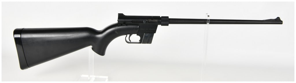 Henry Repeating Arms U.S. Survival Semi-Automatic Rifle .22 Long Rifle with 16.125 Inch Barrel: This lot features a single Henry Repeating Arms U.S. Survival semi-automatic rifle chambered in .22 Long Rifle, designed for portability and storage within its own stock. The rifle features a 16.125