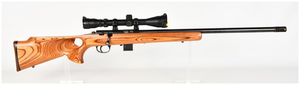 Marlin Model 917V Bolt Action Rifle .17 H.M.R. with 22 Inch Heavy Barrel: This is a Marlin Model 917V bolt-action rifle chambered in .17 H.M.R., designed as a high-velocity rimfire platform for varmint hunting and precision target shooting. The rifle features a 22-inch heav