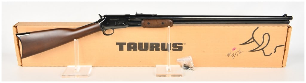 Taurus Model C45 Thunderbolt 26 Inch Barrel Pump-Action Rifle: A Taurus Model C45 Thunderbolt pump-action rifle chambered in .45 Colt featuring a 26 inch blued barrel, checkered wood stock, and original factory box.