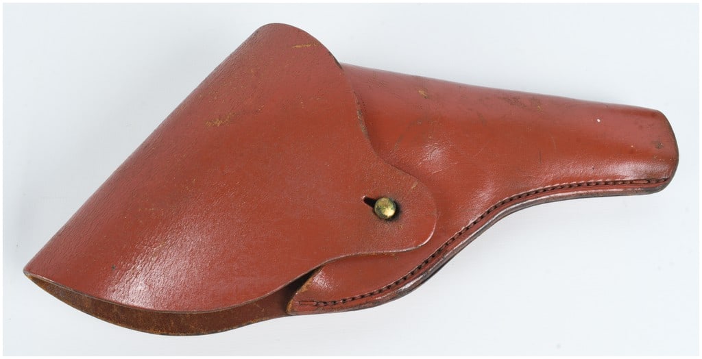 Imperial Japanese Type 14 Nambu Semi-Automatic Pistol Holster: This is a vintage Imperial Japanese military holster crafted from russet-colored leather, specifically designed for use with a Type 14 Nambu semi-automatic pistol. The holster features the characteris