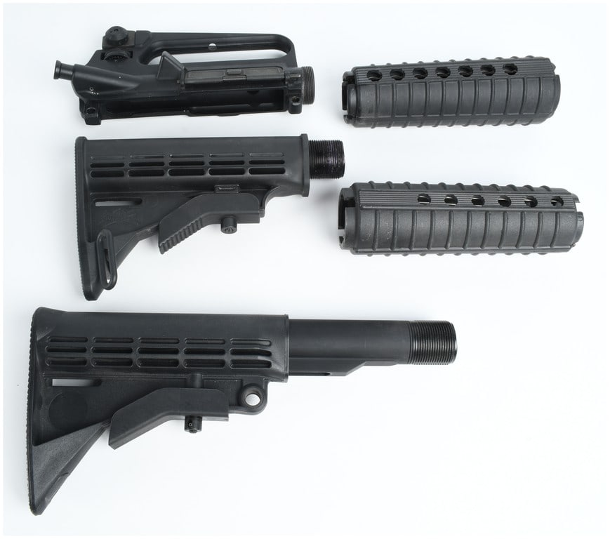 A Collection of 5 AR-15 Components Including a Stripped Upper Receiver and Collapsible Stocks (1 of 7)