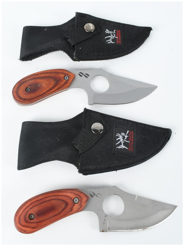 A Pair of Browning Model 387 Rocky Mountain Elk Foundation Field Knives with Sheaths: A pair of Browning Model 387 compact fixed-blade field knives designed for skinning and caping, produced in collaboration with the Rocky Mountain Elk Foundation. Each knife features a stainless steel 