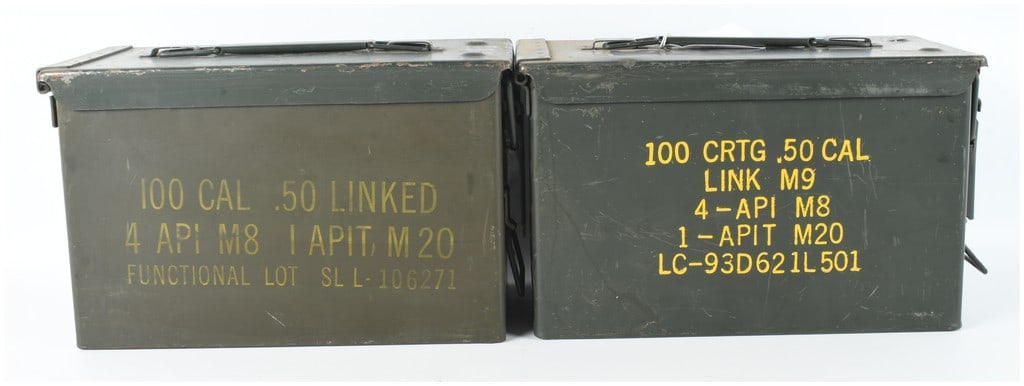 A Pair of US Military M2A1 .50 Caliber Steel Ammunition Containers: This lot consists of two US military issue M2A1 steel ammunition containers, commonly known as ammo cans. These containers are constructed of heavy-gauge steel with a standard olive drab finish and fe
