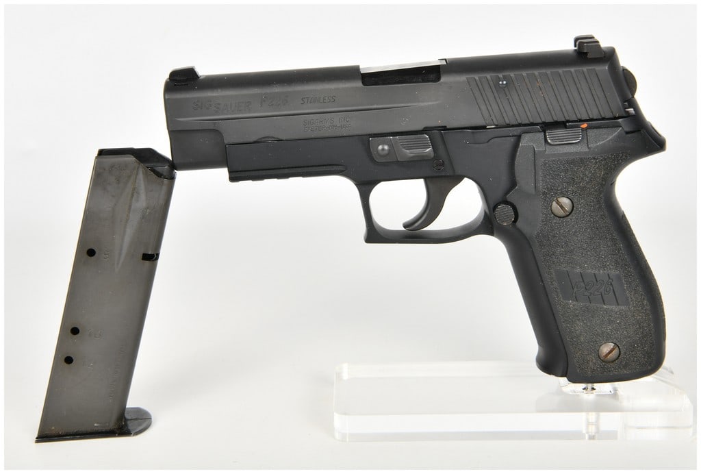 SIG Sauer P226 Semi-Automatic Pistol .40 S&W with 4.4 Inch Barrel: This SIG Sauer P226 is a full-sized semi-automatic pistol chambered in .40 S&W designed for service and self-defense. It features a 4.4 inch barrel and a stainless steel slide finished in a matte blac
