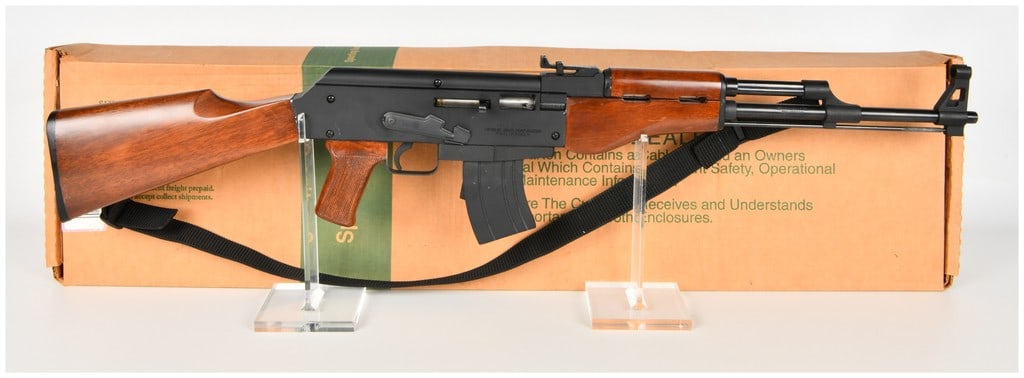 Armscor AK 47/22 Semi-Automatic Rifle .22 LR with 18.5 Inch Barrel: This Armscor Model AK 47/22 is a semi-automatic rimfire rifle designed as a replica of the AK-47 platform chambered in .22 Long Rifle. The rifle features an 18.5-inch barrel fitted with a hooded front